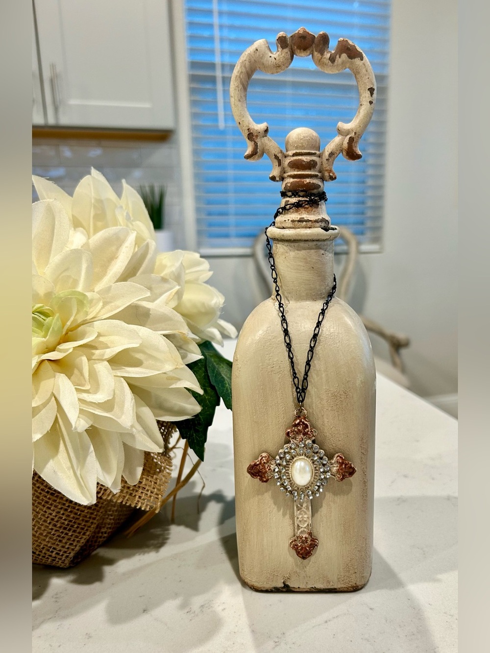 French Country Decorated bottle with cross on chain and faux gems